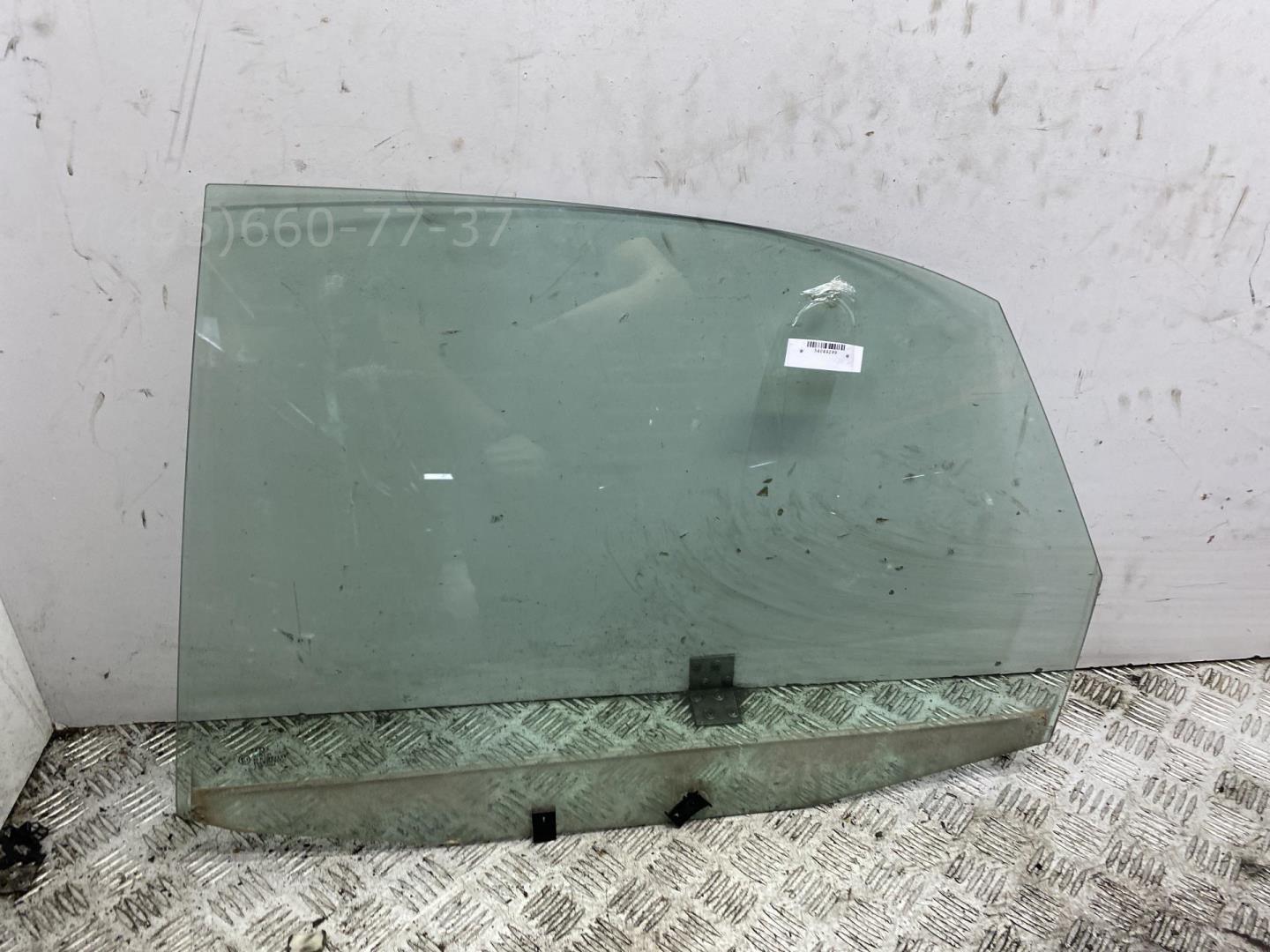 Стекло двери задней левой