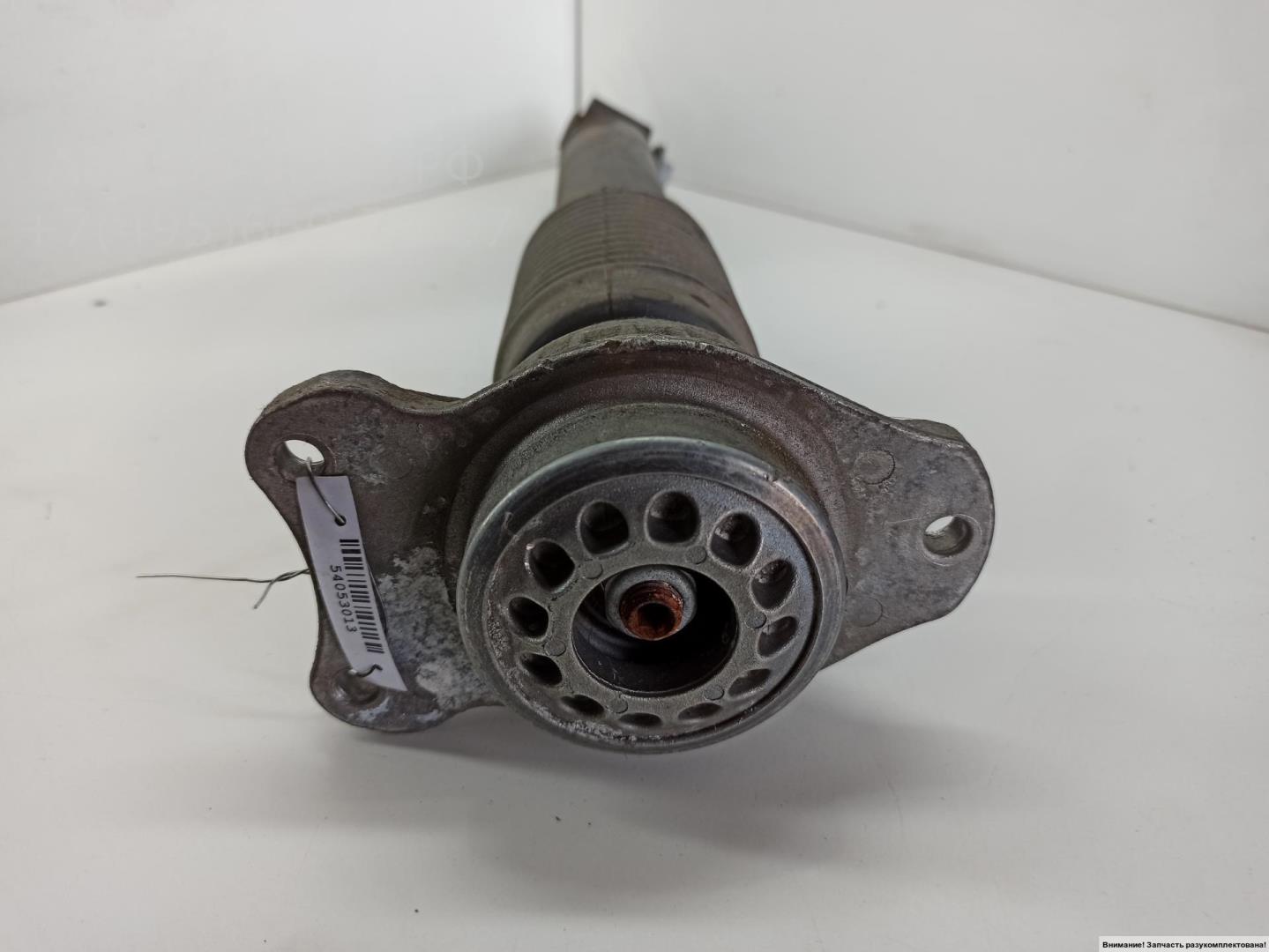 Амортизатор задний левый