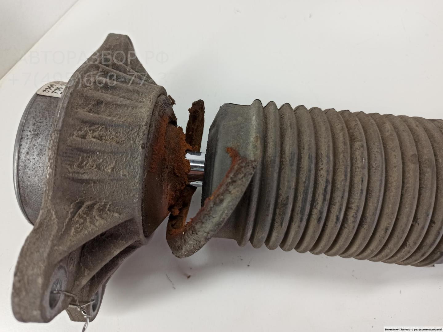 Амортизатор задний левый