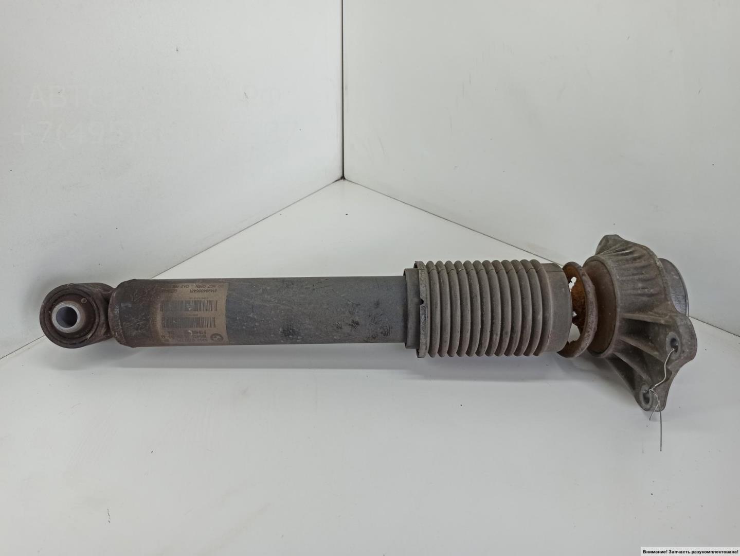 Амортизатор задний левый