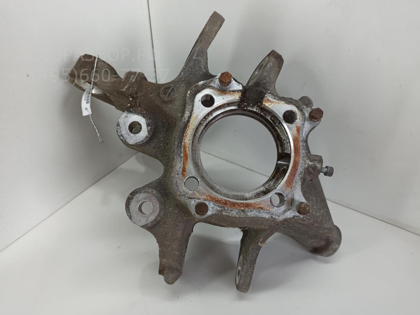 Кулак поворотный задний левый