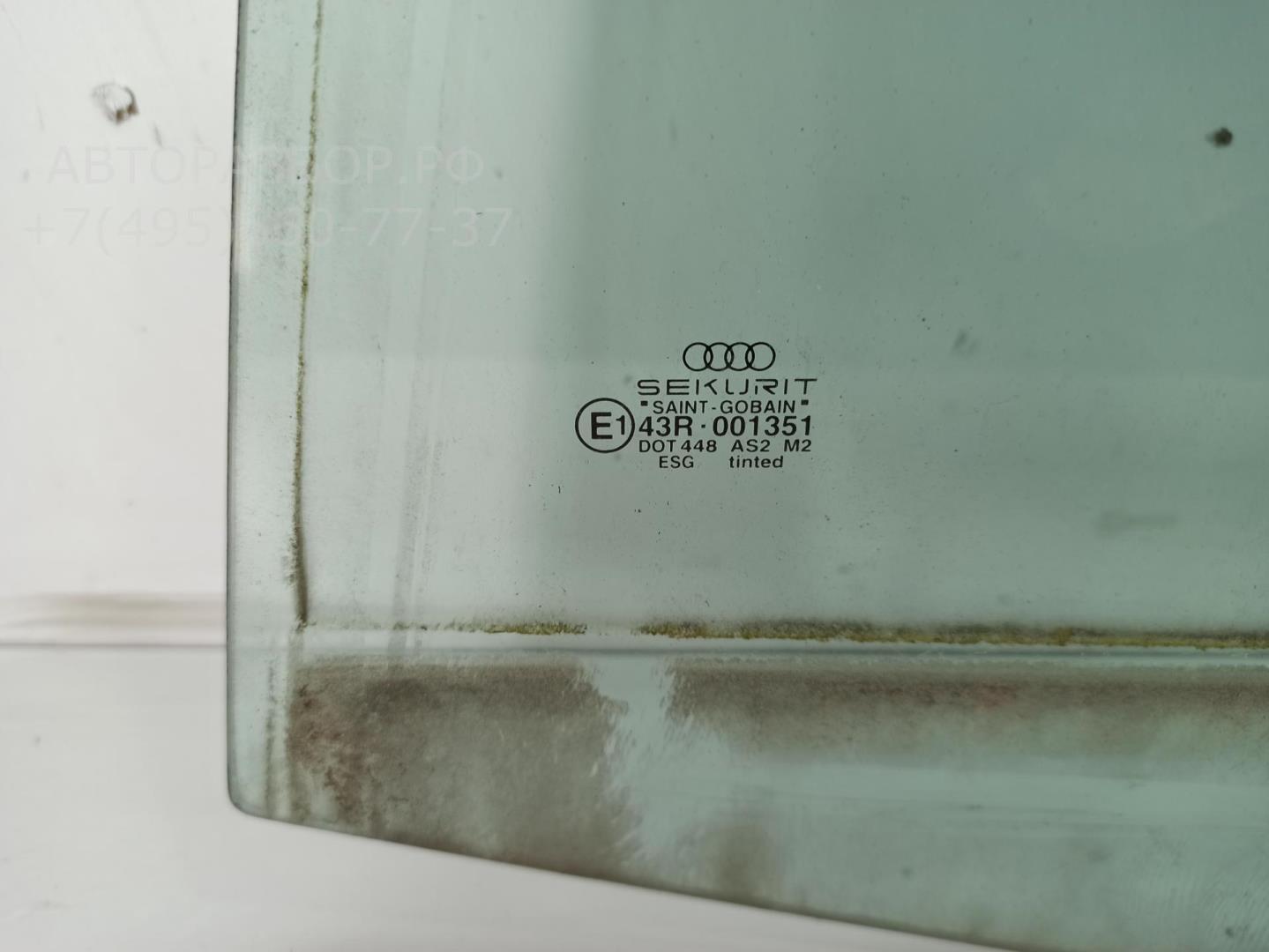 Стекло двери задней левой