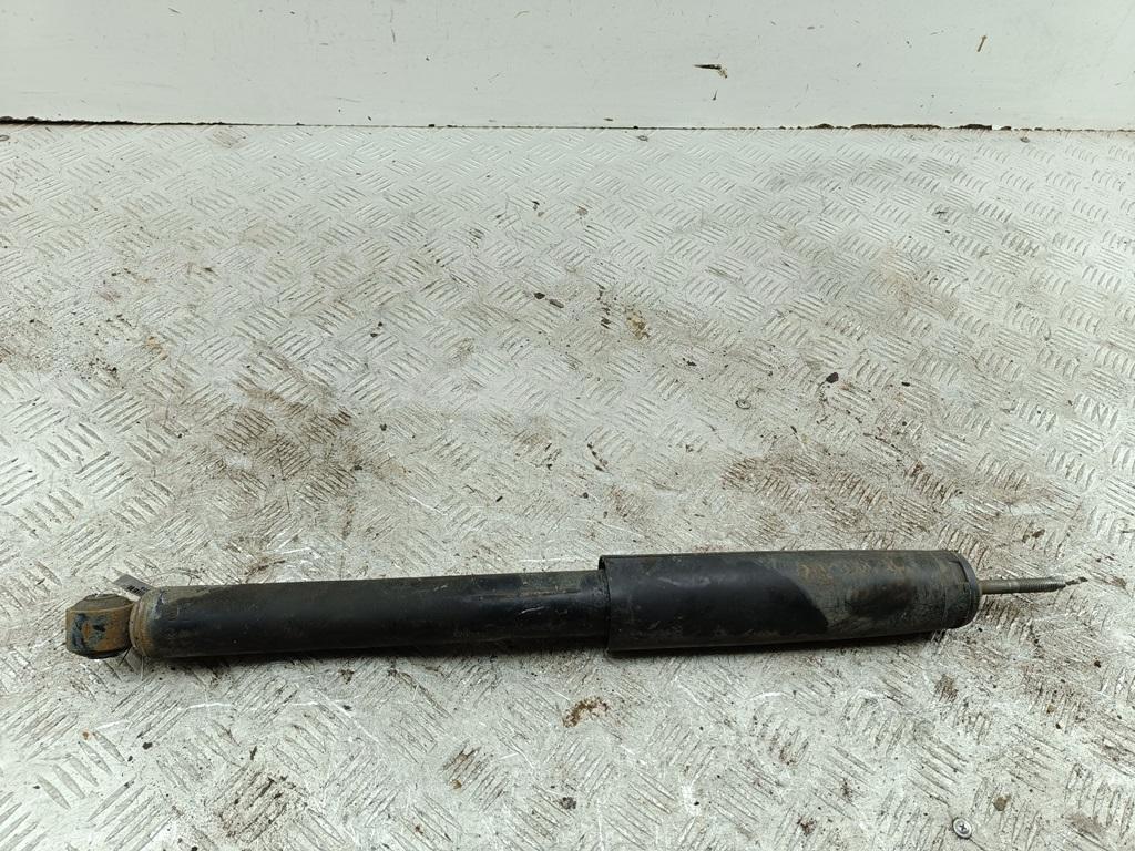 Амортизатор задний левый