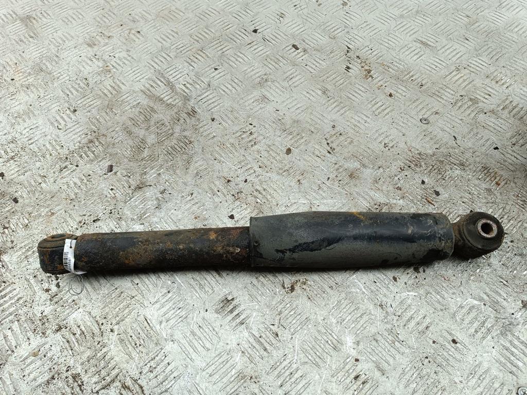 Амортизатор задний левый