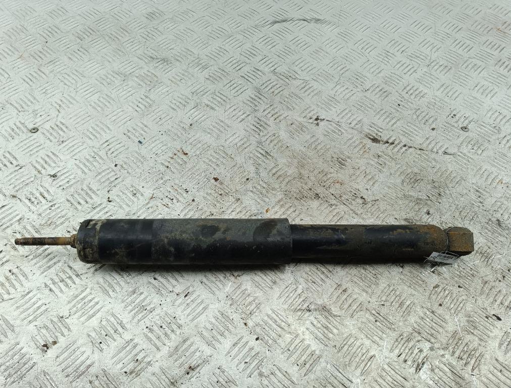 Амортизатор задний левый