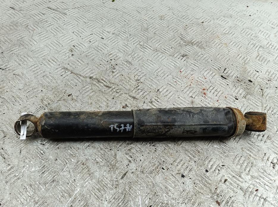 Амортизатор задний левый