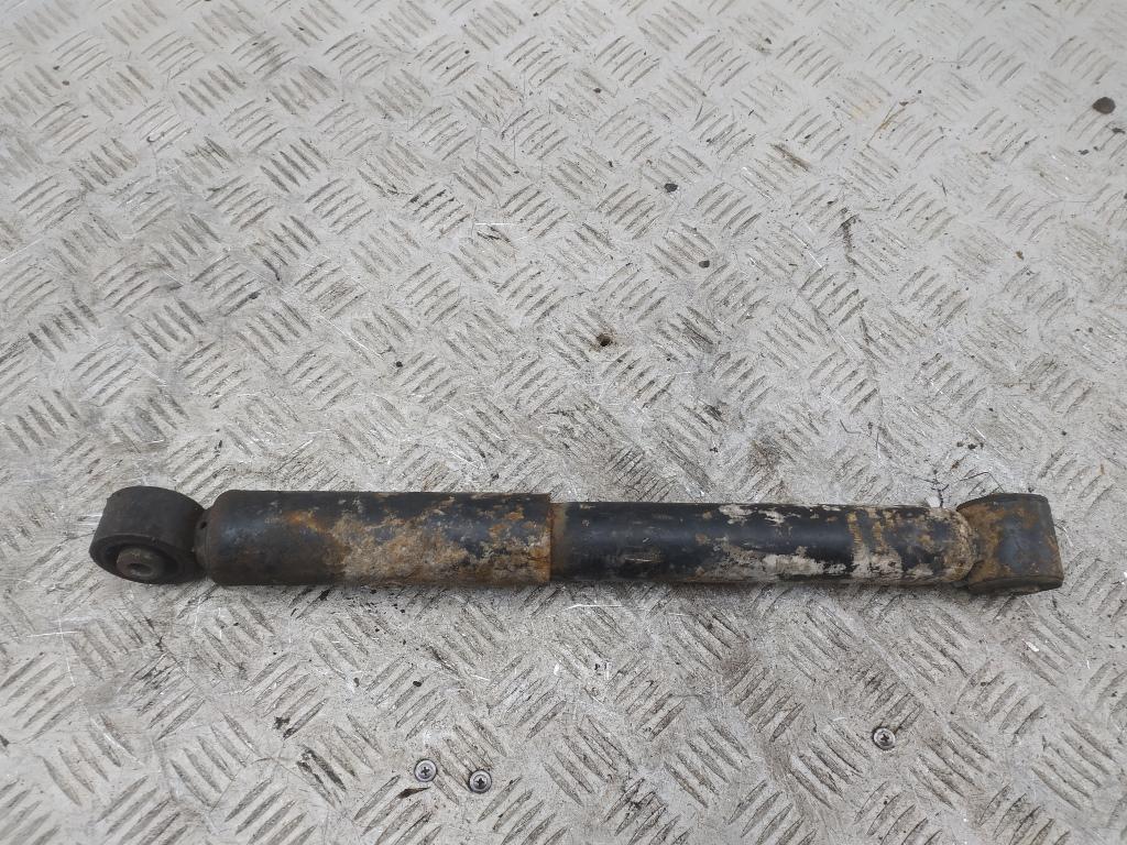 Амортизатор задний левый