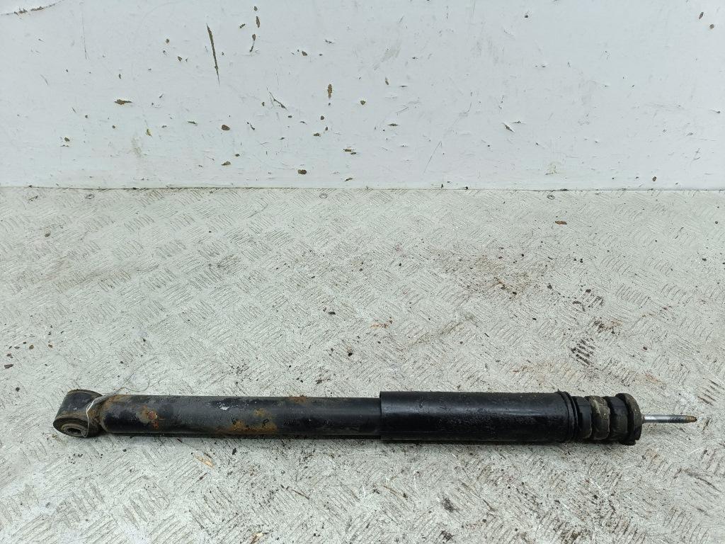 Амортизатор задний левый