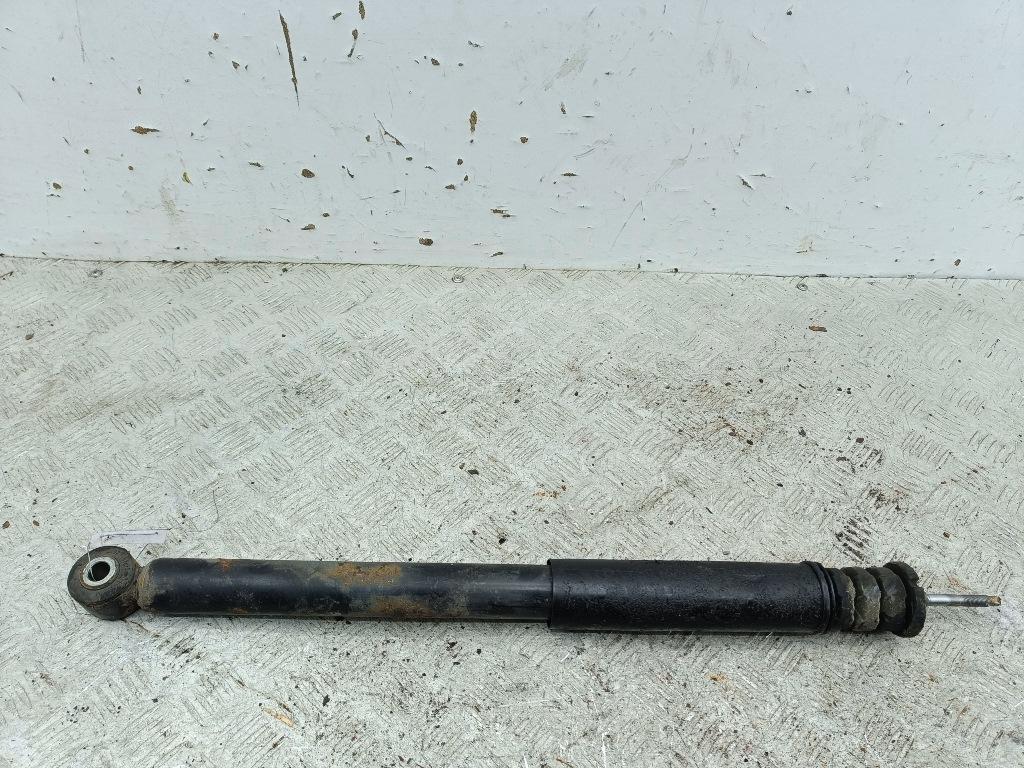 Амортизатор задний левый