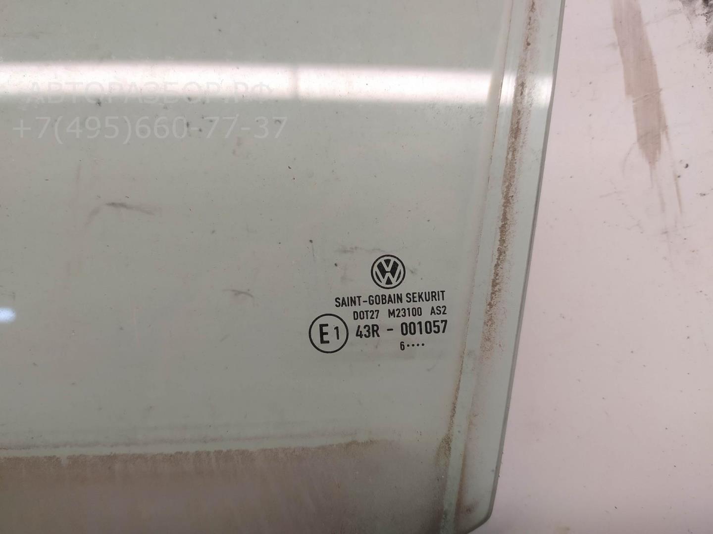 Стекло двери задней левой