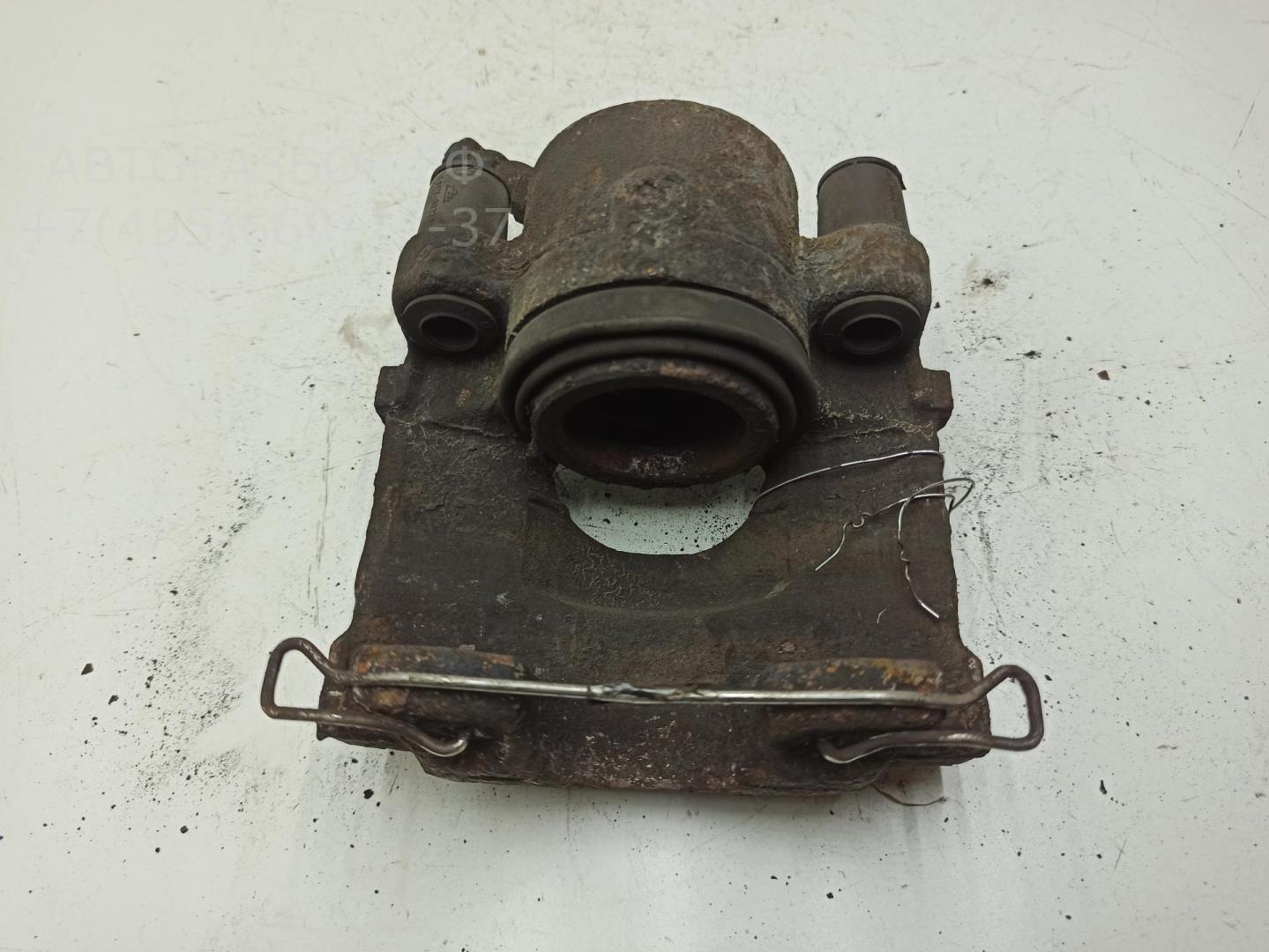 Суппорт передний левый