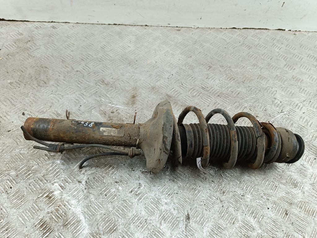 Амортизатор передний левый