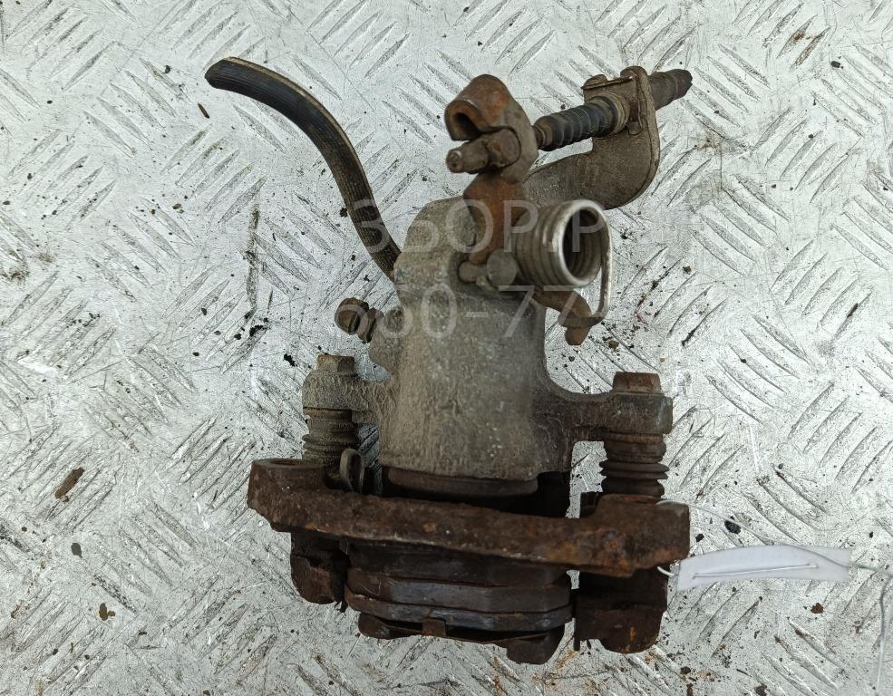 Суппорт задний левый