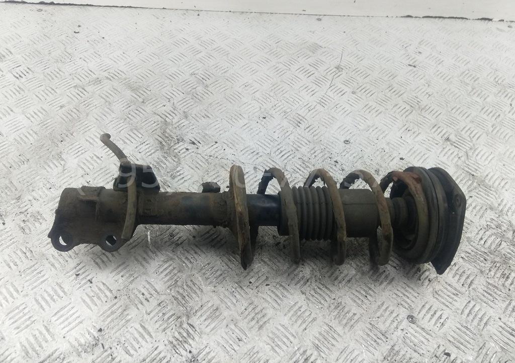 Амортизатор передний левый