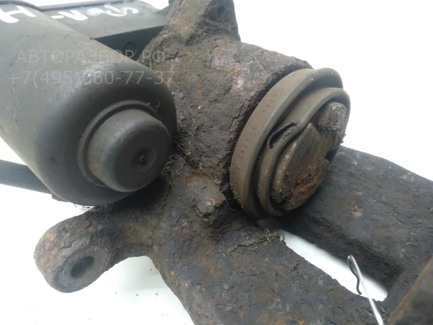 Суппорт задний левый