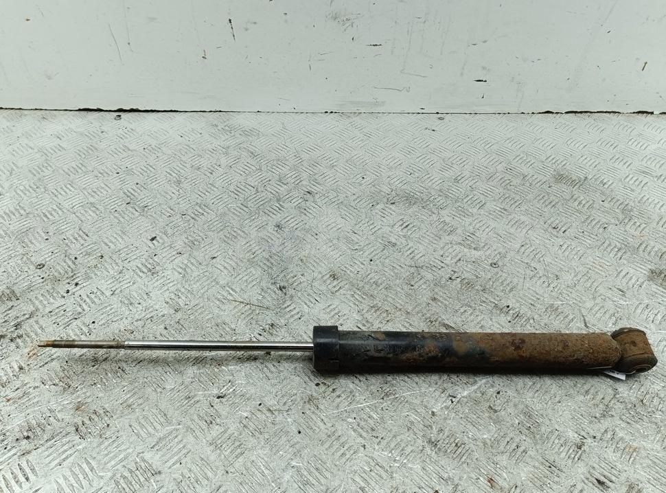 Амортизатор задний левый