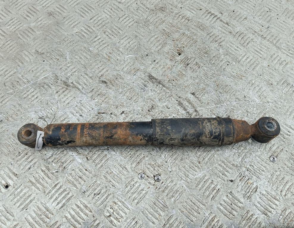 Амортизатор задний левый