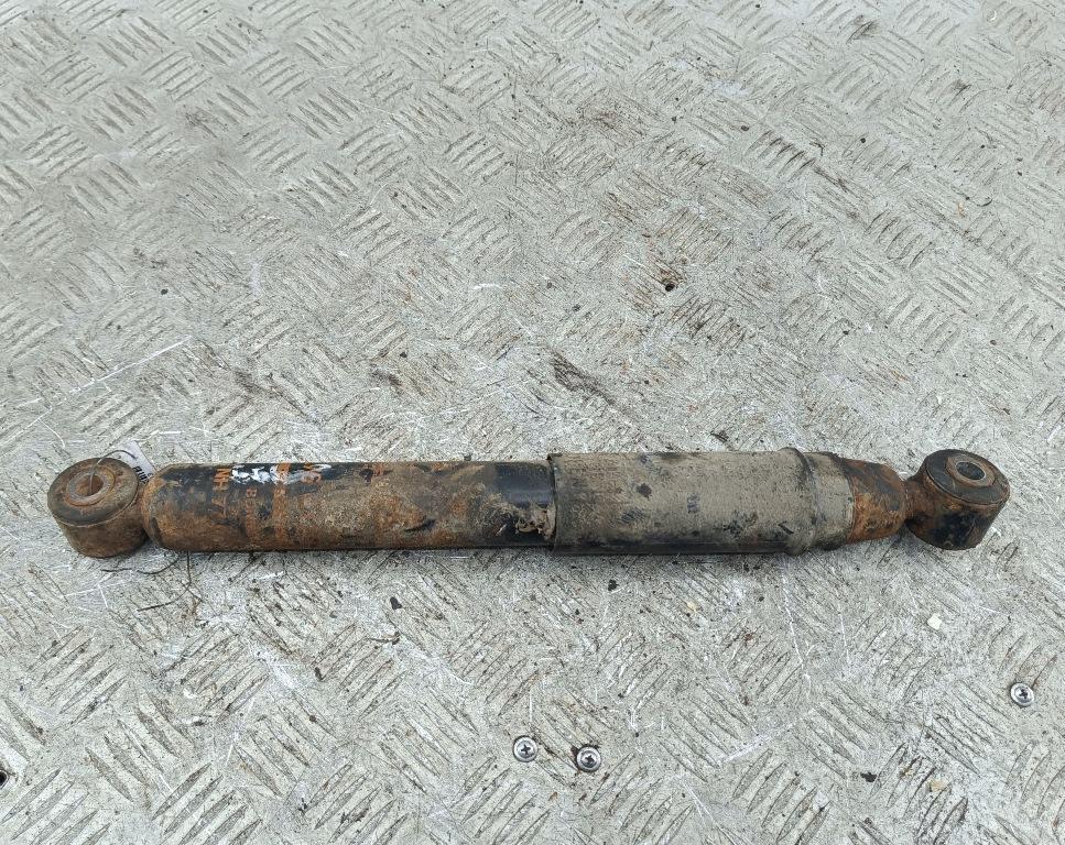 Амортизатор задний левый