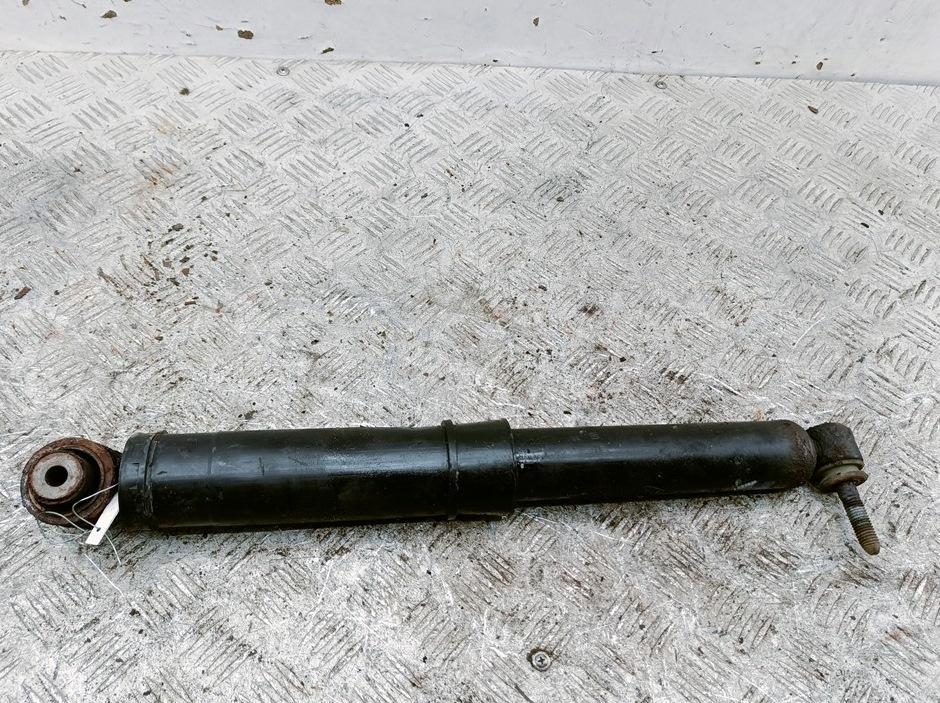 Амортизатор задний левый