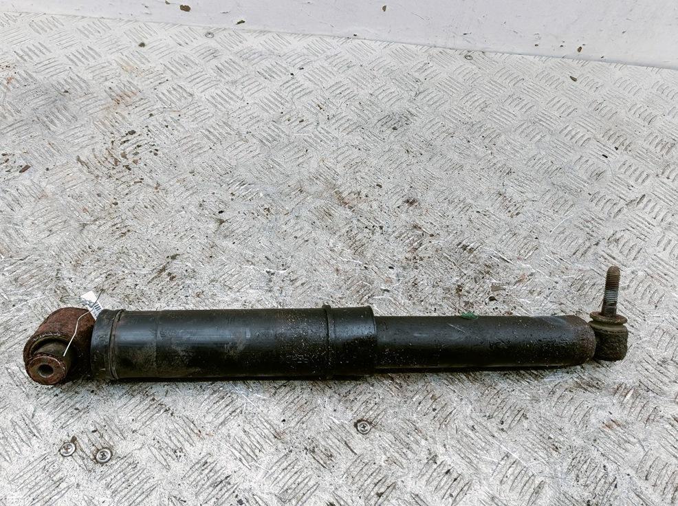 Амортизатор задний левый