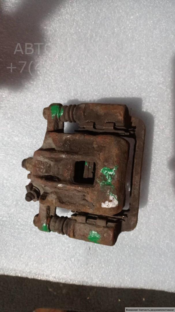 Суппорт задний левый