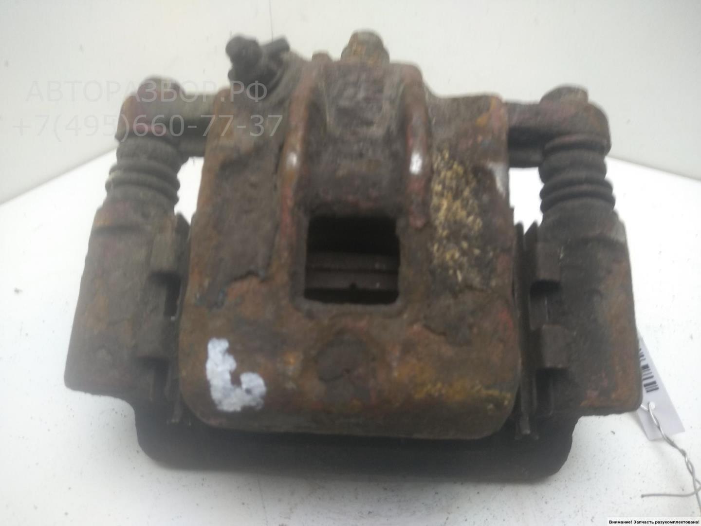 Суппорт задний левый