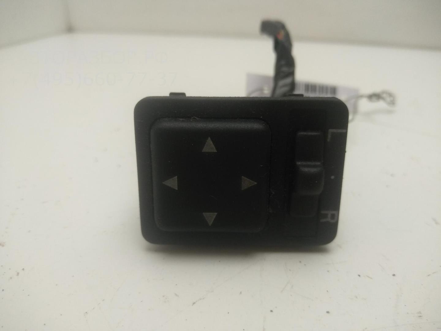 Кнопка регулировки зеркала