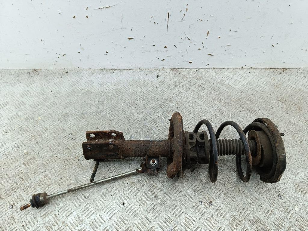 Амортизатор передний левый