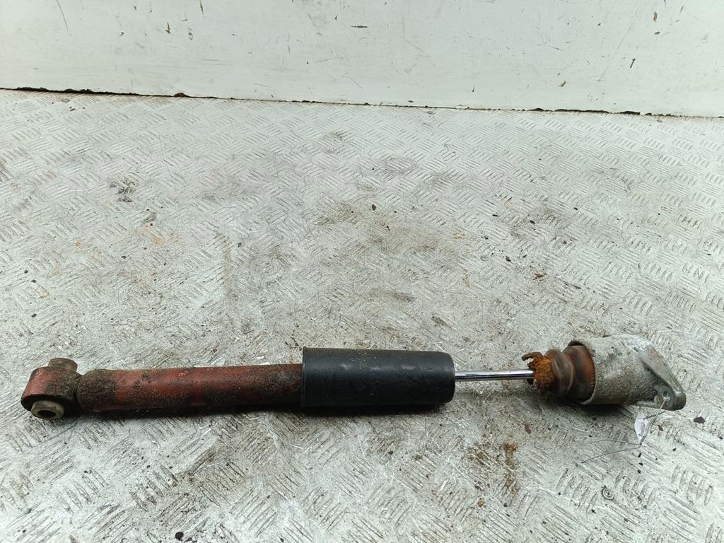 Амортизатор задний левый