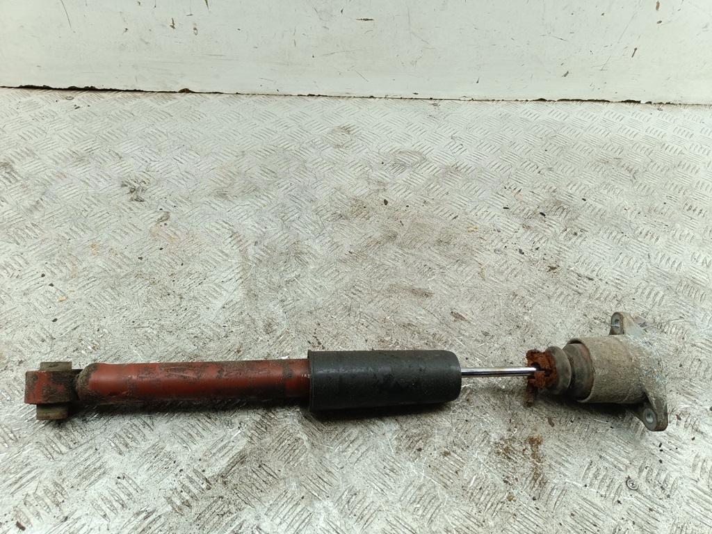 Амортизатор задний левый