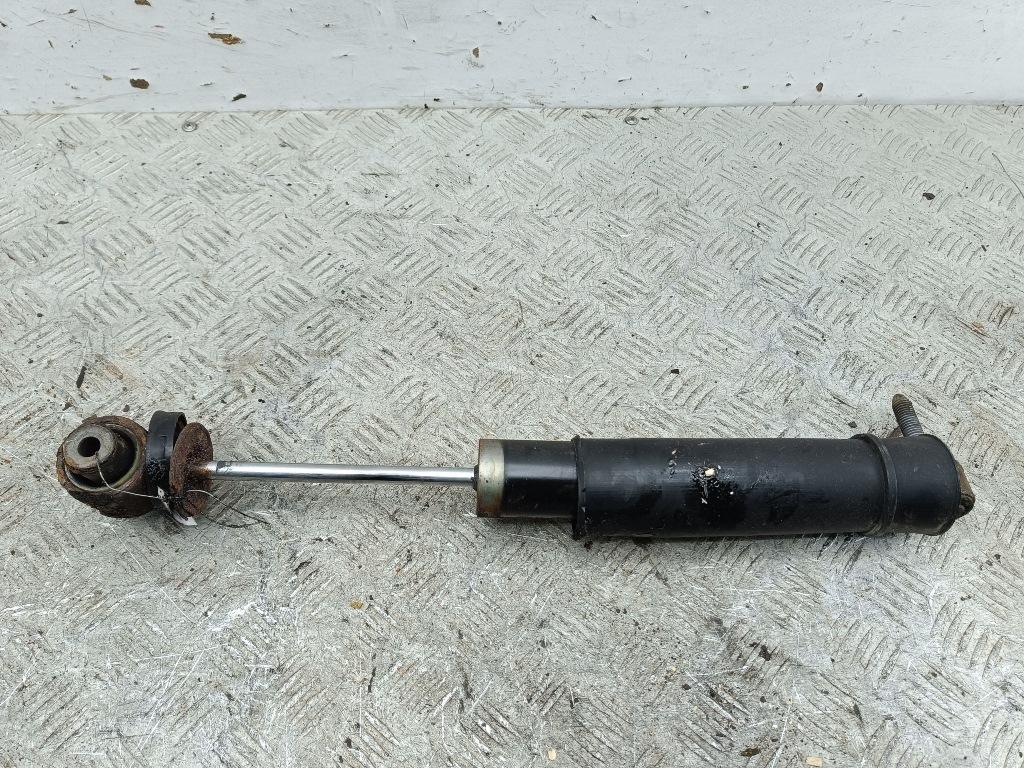 Амортизатор задний левый