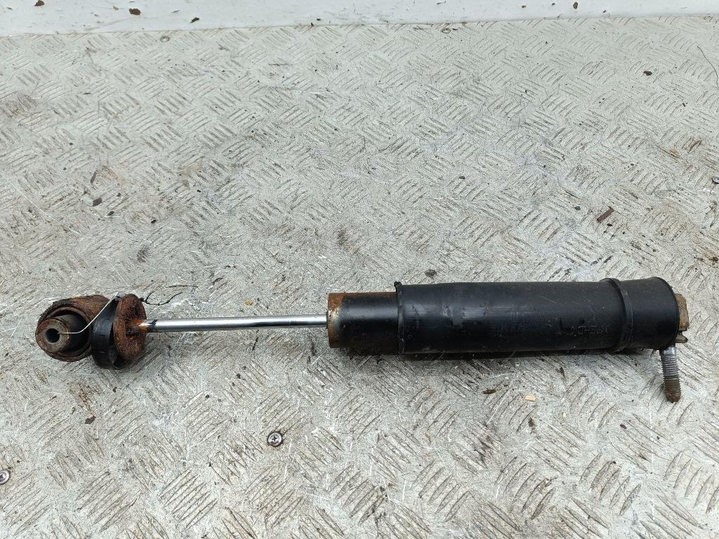 Амортизатор задний левый