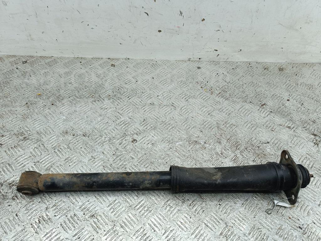 Амортизатор задний левый