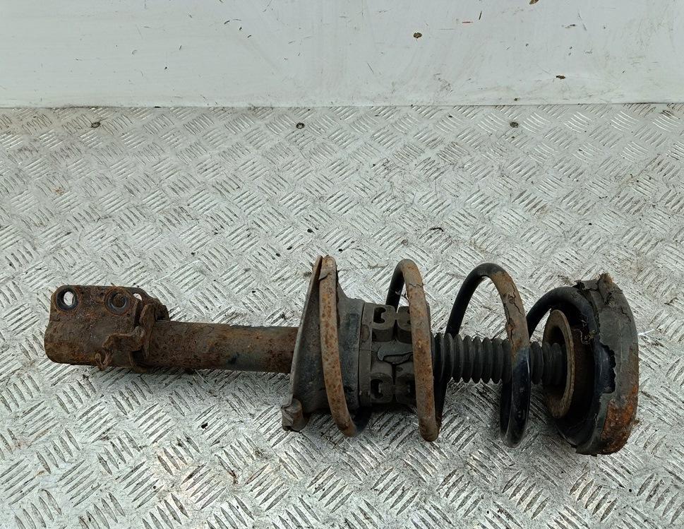 Амортизатор передний левый