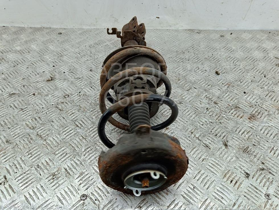 Амортизатор передний левый