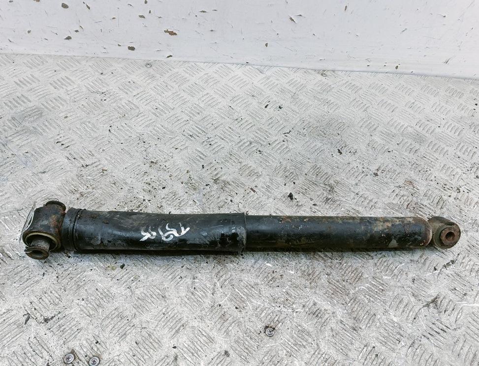 Амортизатор задний левый