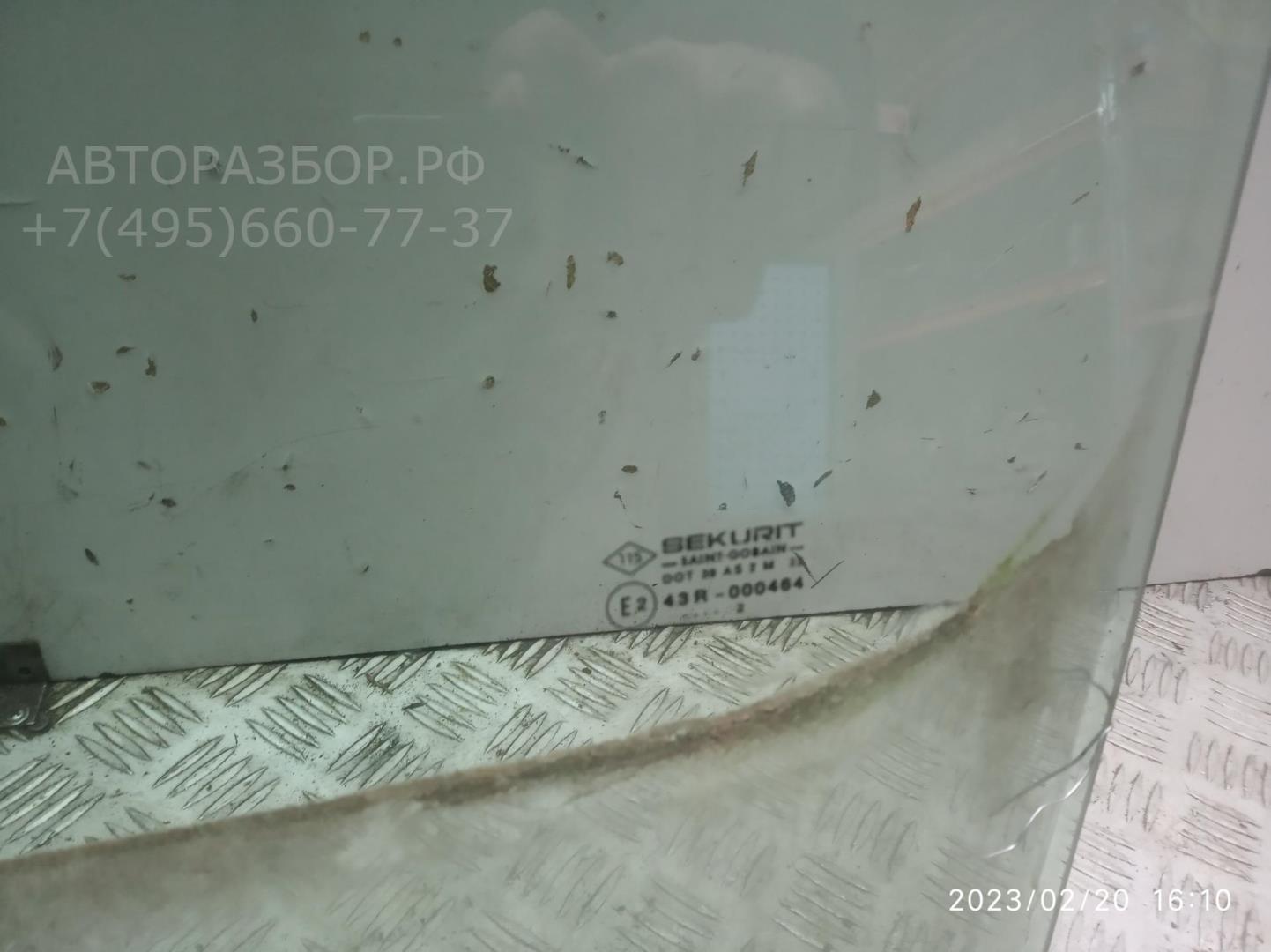Стекло двери передней левой