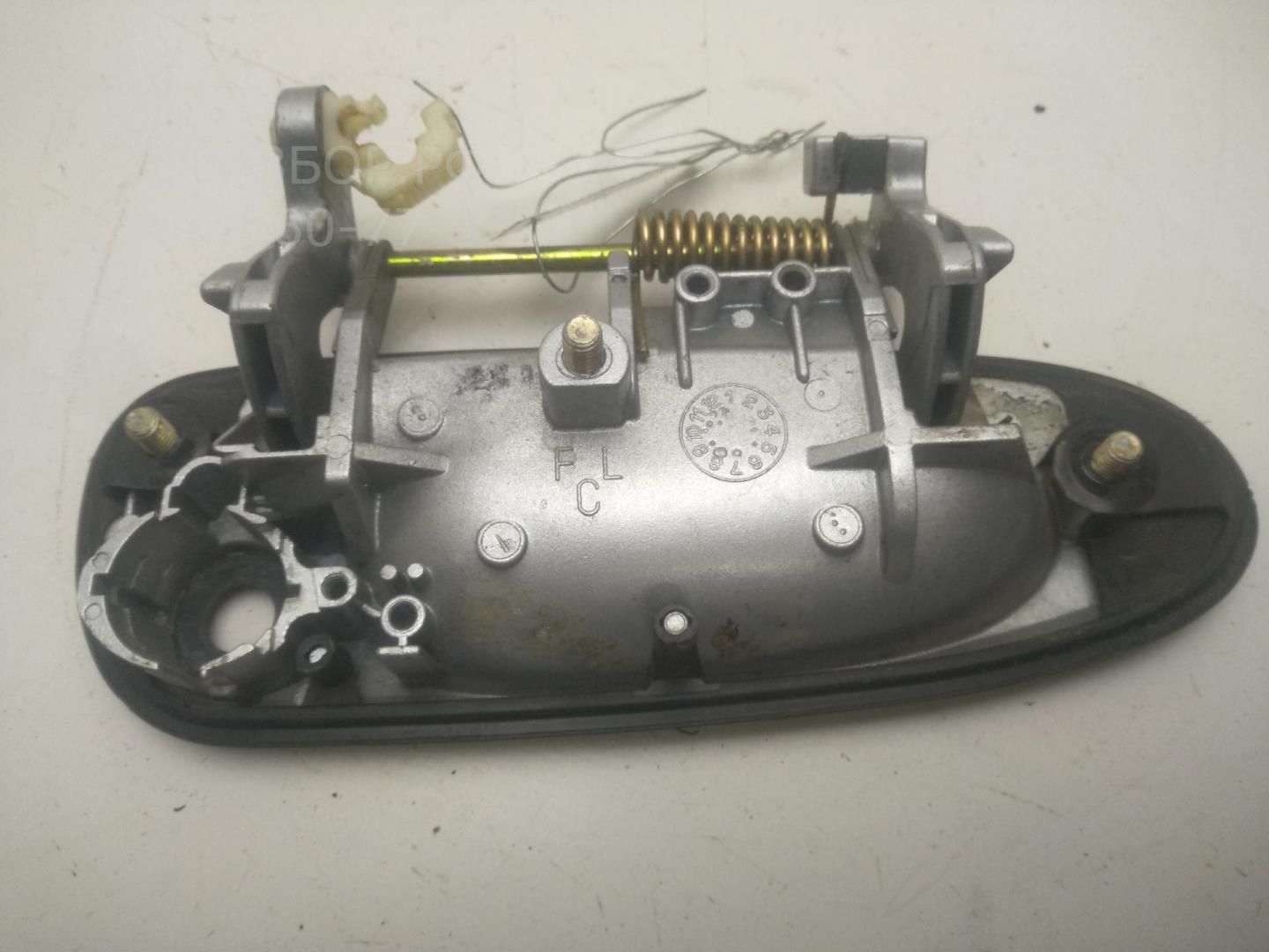 Ручка двери передней наружная левая