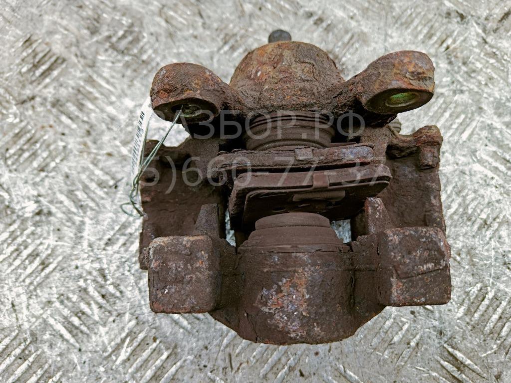 Суппорт задний левый