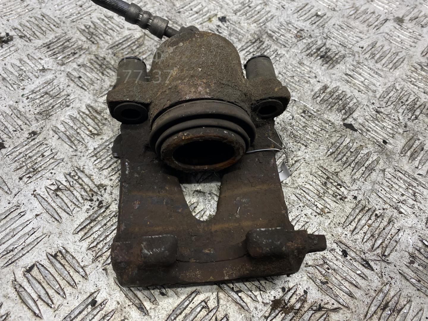 Суппорт передний левый