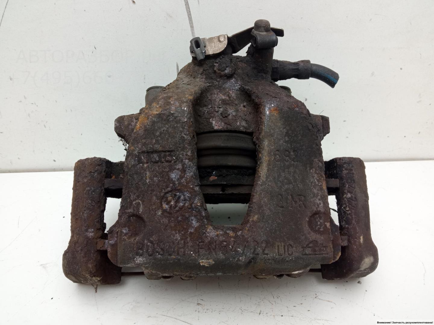 Суппорт передний левый