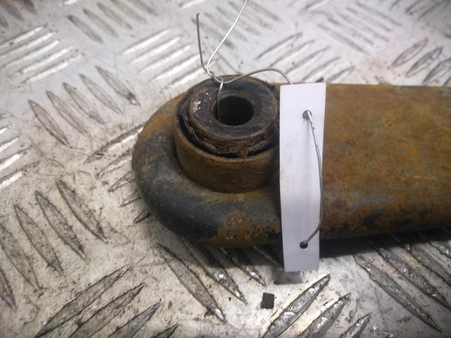 Рычаг задний левый