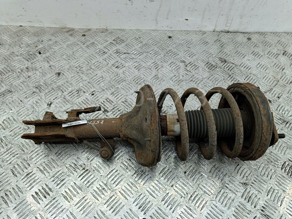 Амортизатор передний левый