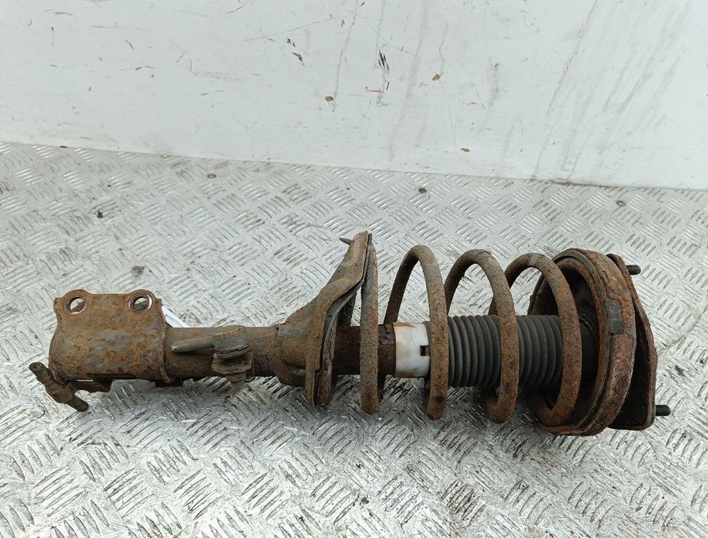 Амортизатор передний левый