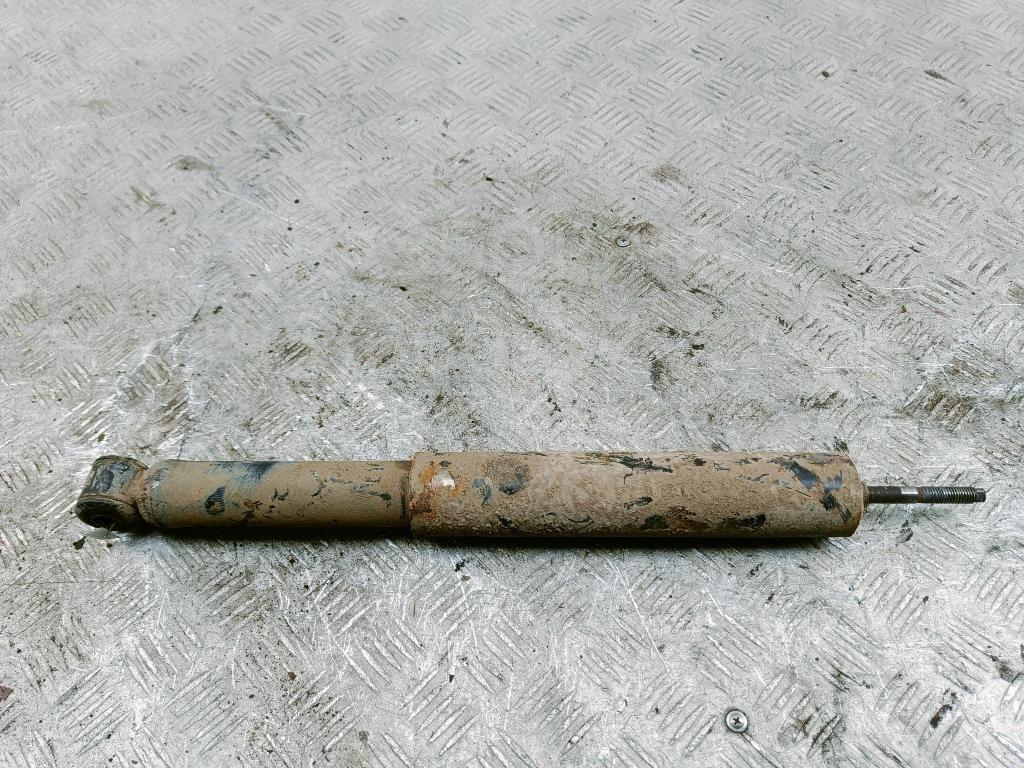 Амортизатор задний левый