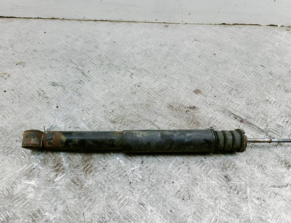 Амортизатор задний левый