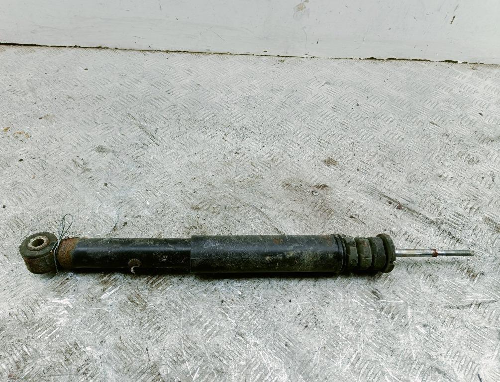 Амортизатор задний левый