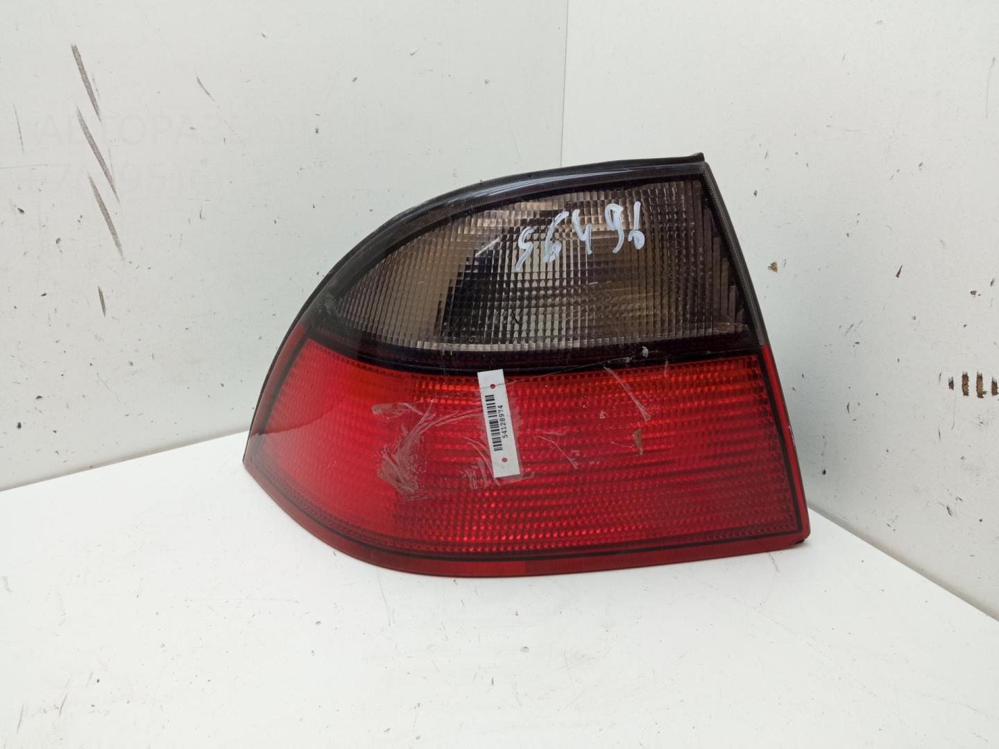 Фонарь задний левый