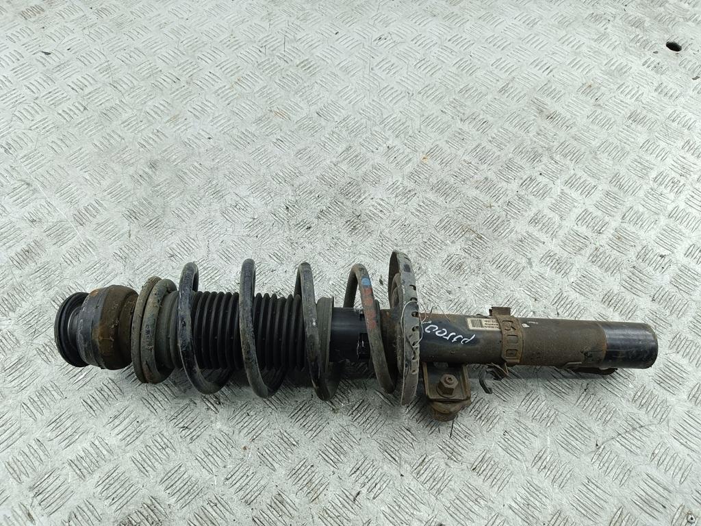 Амортизатор передний левый