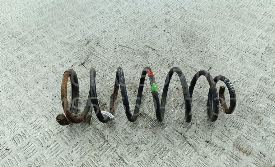 Пружина задняя